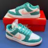 نایک اس بی دانک لو فیروزه‌ای پوست ماری Nike Dunk Low Snakeskin Washed Teal Bleached Coral