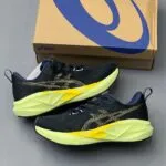 اسیکس نوابلاست 5 سرمه‌ای تیره زرد ASICS Novablast 5 Indigo Blue Amber