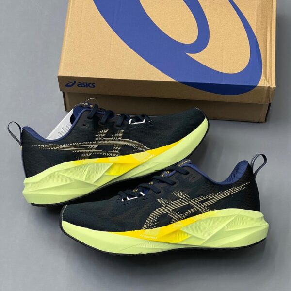 اسیکس نوابلاست 5 سرمهای تیره زرد ASICS Novablast 5 Indigo Blue Amber اسیکس نوابلاست 5 سرمهای تیره زرد ASICS Novablast 5 Indigo Blue Amber