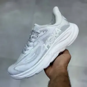 کفش هوکا کلیفتون 10 سفید خاکستری Hoka Clifton 10 Cosmic Grey Stardust کفش هوکا کلیفتون 10 سفید خاکستری Hoka Clifton 10 Cosmic Grey Stardust