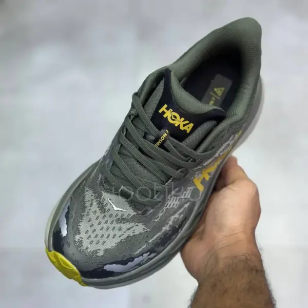 هوکا استینسون 7 زیتونی طرح جنگلی Hoka Stinson 7 Olive Haze Forest Cover هوکا استینسون 7 زیتونی طرح جنگلی Hoka Stinson 7 Olive Haze Forest Cover
