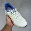 کفش ورزشی اسیکس ژل کایانو 32 GEL-KAYANO 32 Cream/Denim Blue کفش ورزشی اسیکس ژل کایانو 32 GEL-KAYANO 32 Cream/Denim Blue