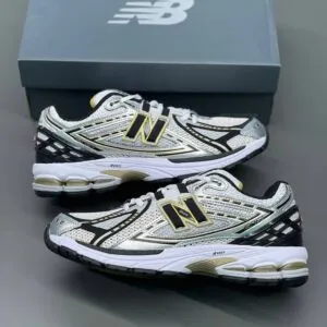 کفش نیوبالانس 1906 سفید متالیک گلد New Balance 1906R White Metallic Gold کفش نیوبالانس 1906 سفید متالیک گلد New Balance 1906R White Metallic Gold