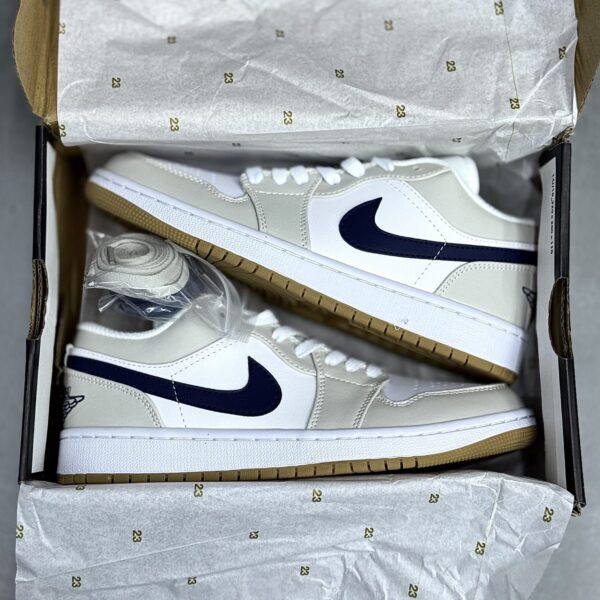 کفش نایک ایر جردن وان لو شیری تیک سرمه‌ای Nike Air Jordan 1 Low Cream Navy Swoosh