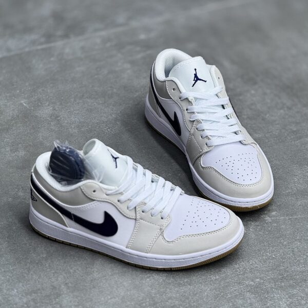 کفش نایک ایر جردن وان لو شیری تیک سرمه‌ای Nike Air Jordan 1 Low Cream Navy Swoosh