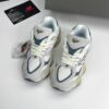 کتونی نیوبالانس ۹۰۶۰ کرم سورمهای New Balance 9060 Cream Navy کتونی نیوبالانس ۹۰۶۰ کرم سورمهای New Balance 9060 Cream Navy