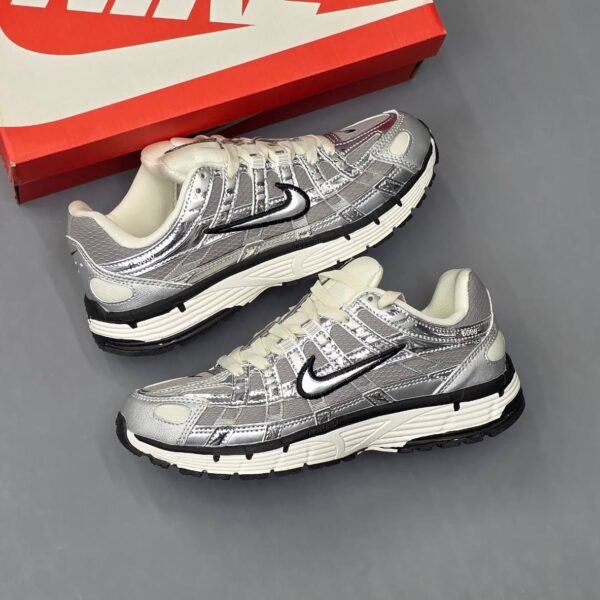 کفش نایک پی ۶۰۰۰ نقرهای مشکی Nike P6000 Silver Black کفش نایک پی ۶۰۰۰ نقرهای مشکی Nike P6000 Silver Black