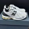 کفش نیوبالانس 1906 کرم مشکی New Balance 1906 Cream Black کفش نیوبالانس 1906 کرم مشکی New Balance 1906 Cream Black