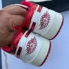 کفش نایک ایر جردن وان لو یاقوتی Nike Air Jordan 1 Low Ruby کفش نایک ایر جردن وان لو یاقوتی Nike Air Jordan 1 Low Ruby - تصویر 3