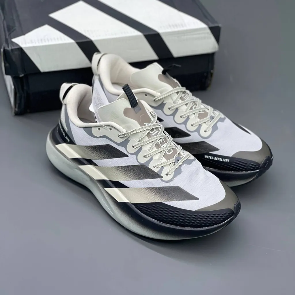 آدیداس آدیزیرو ایوو اسال ایتیآر بژ مشکی طوسی adidas Adizero Evo SL ATR Beige Black KK0309 آدیداس آدیزیرو ایوو اسال ایتیآر بژ مشکی طوسی adidas Adizero Evo SL ATR Beige Black KK0309